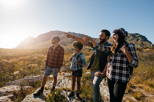Young people hiking on extreme terrain
