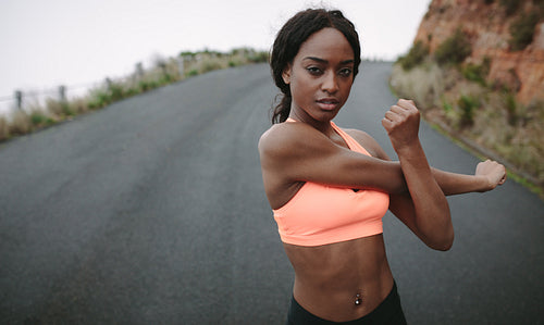 Woman exercising in jogging gear