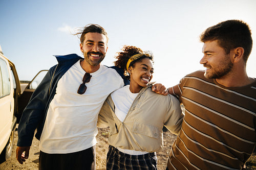 Friends on a sunny road trip share laughter and build a strong bond outdoors
