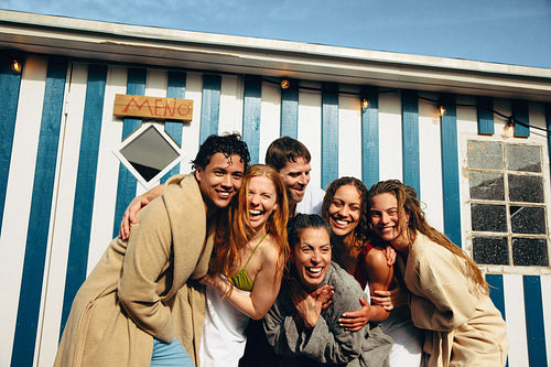 The therapy of wellness brings friends together outside a sauna bathhouse