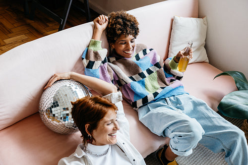 Creative colleagues relaxing in a modern co-working space
