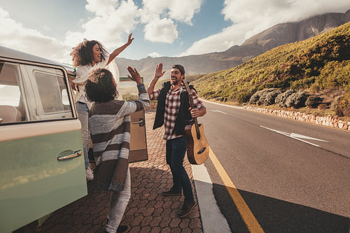Group of friends enjoying on road trip