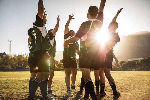 Rugby team celebrating the victory