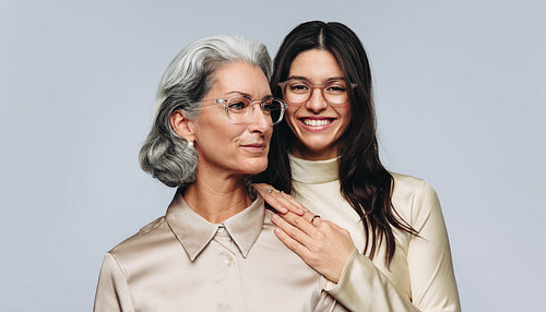 Women of different ages wearing eyeglasses in optometry campaign