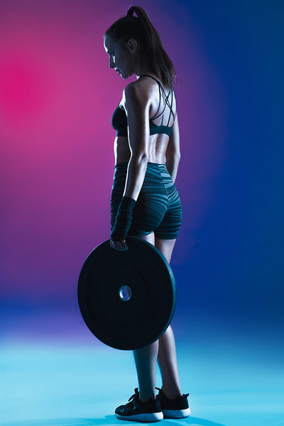 Woman exercising with weights