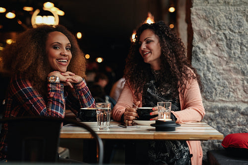 Two female friends at cafe