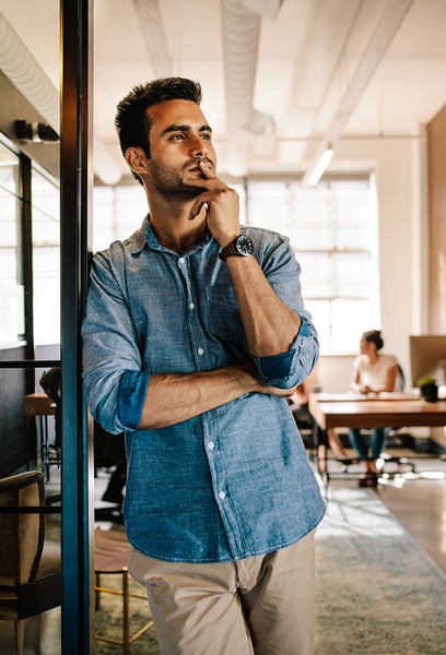 Thoughtful young male at startup office