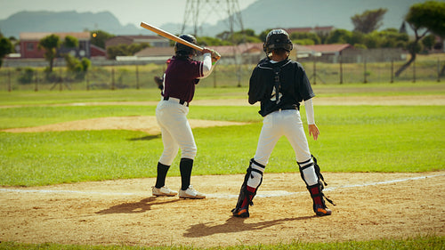 Athlete hits a baseball and runs the bases