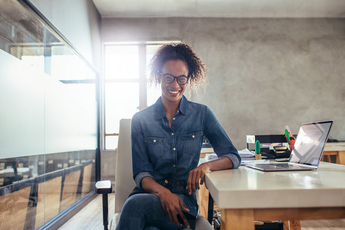 African woman at work – Jacob Lund Photography Store- premium stock photo