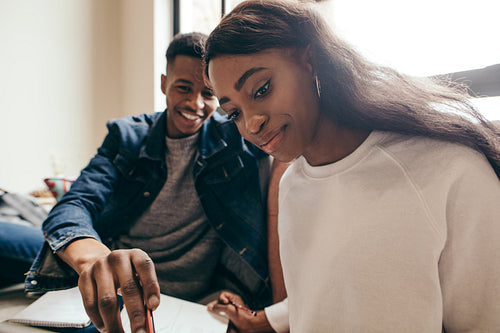 Two student studying together at college campus
