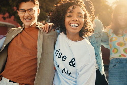 Happy friends enjoying a fun summer day outdoors with smiles and joy