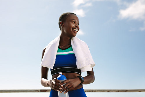 Sportswoman taking break after workout session
