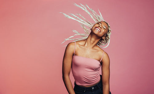 Happy african american woman dancing