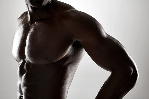 Young african man with muscular body