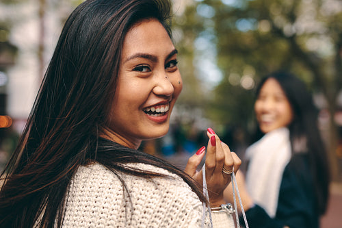 Close up of a smiling asian woman