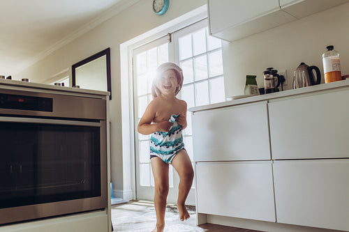 Kid coming out after a bath