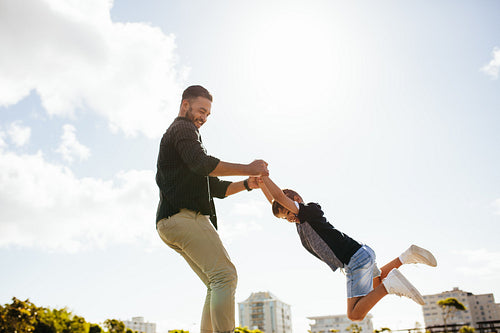 Father and son playing outdoors