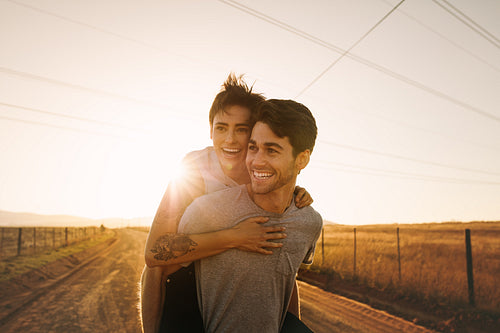 Couple enjoying outdoors on a mud track