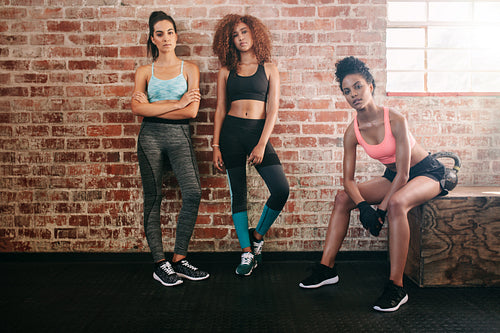 Mixed race female friends in gym