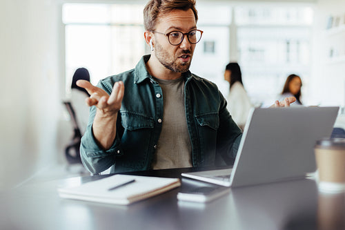 Business man having a video call in an office