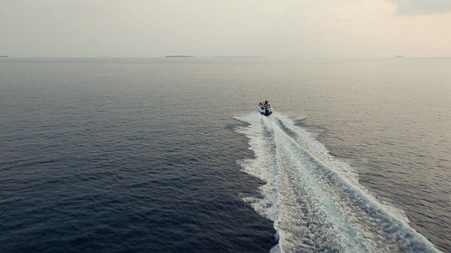 Speedboat cruising on open water