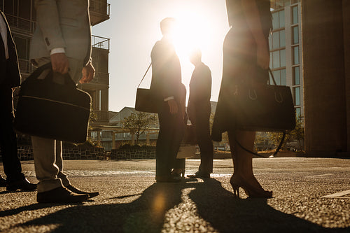 Office going people commuting on a busy street