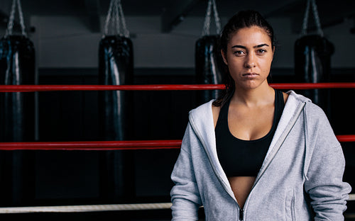 Female boxer inside a boxing ring