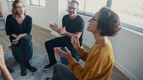 Corporate professionals in a personal development training program