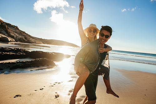 Couple enjoying beach holidays