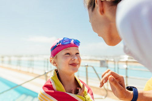 Girl getting swimming lessons