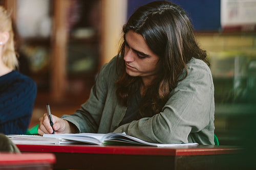 Student in university classroom