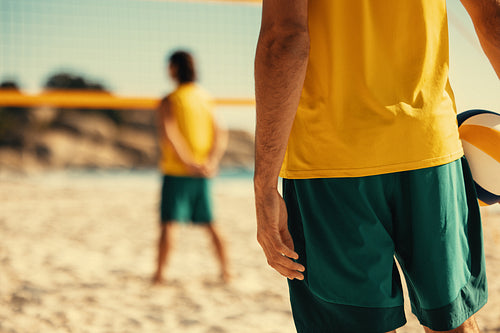 Professional athlete participating in beach volleyball tournament