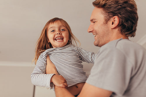 Father and daughter playing