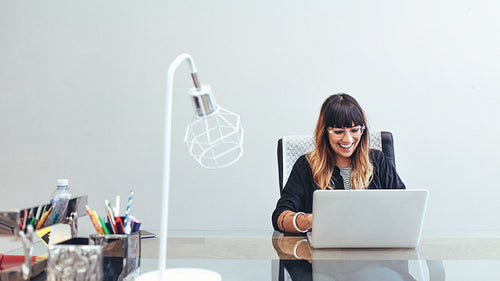 Businesswoman at work sitting in office