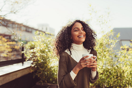 Woman enjoying a cup of coffee