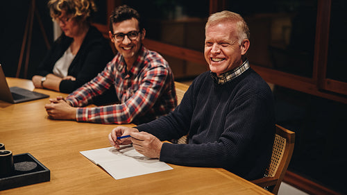 Senior businessman in office board room