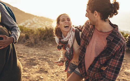 Friends having great time on hike