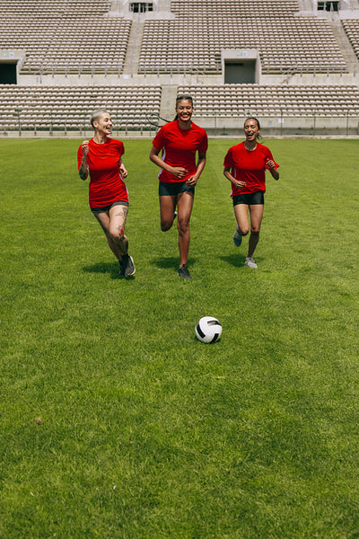 Football players training in soccer field