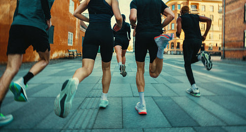 Anonymous run club navigating city streets for fitness and community