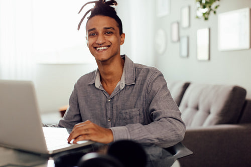 Happy businessman at home