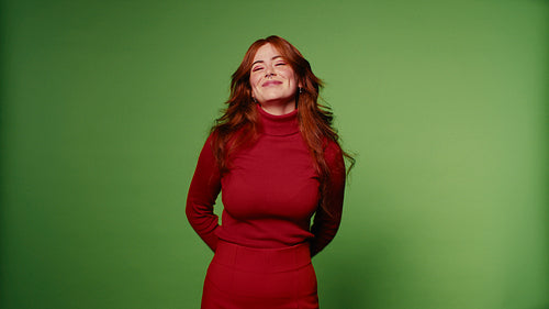 Happy woman waving on green screen background