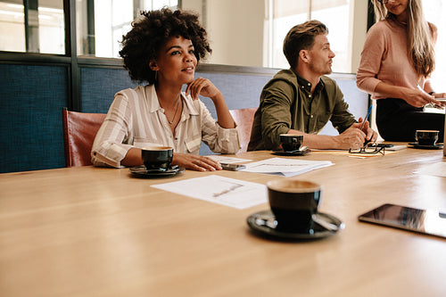 African business woman in meeting with colleagues in office