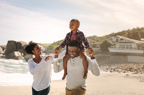 Family having fun on beach vacation