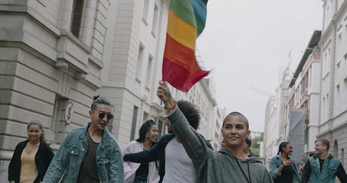Group of people participating on gay pride march