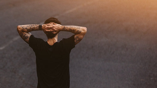 Man relaxing after morning run