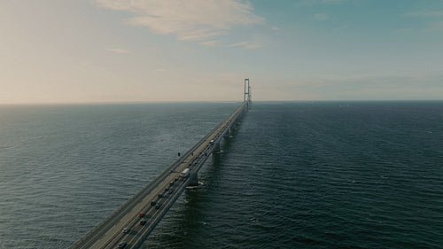 Aerial view of Denmark's Storebæltsbroen Bridge, with the scenic roadway and steady traffic