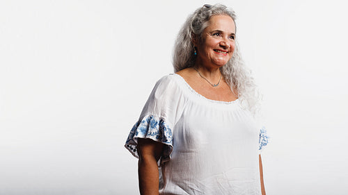 Portrait of cheerful senior woman