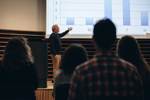 Businessman giving a presentation during summit