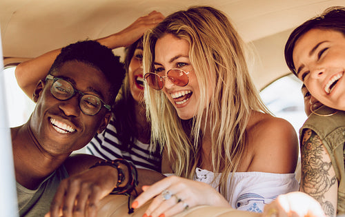 Friends enjoying on a road trip