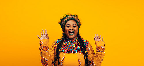 Cheerful ethnic woman wearing traditional clothing